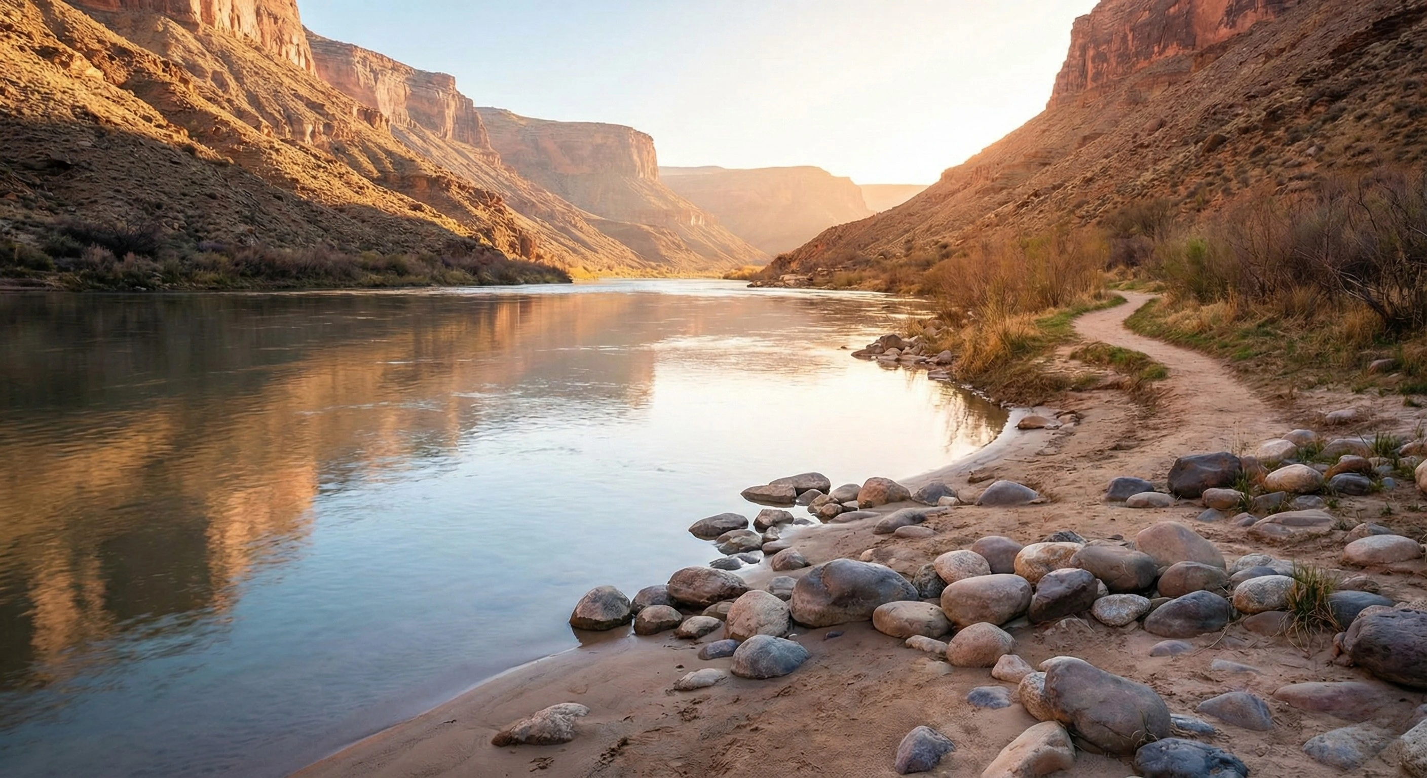 Serene river flowing past a sandy bank and smooth stones, symbolizing the shift from feeling stuck to settled during EMDR Intensive therapy at Three Rivers Counseling in Covington, LA 70433